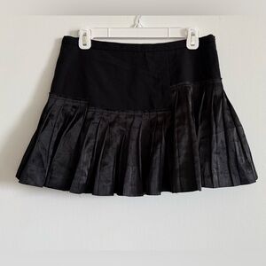 BCBG Max Azria Black Mini Skirt 
Size 4